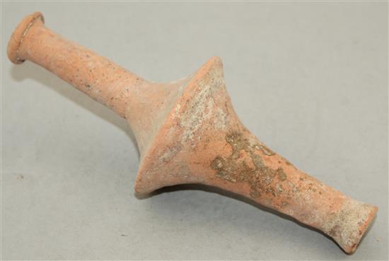 A Greek Hellenisitic terracotta spindle flask, 3rd century B.C., 20.5cm